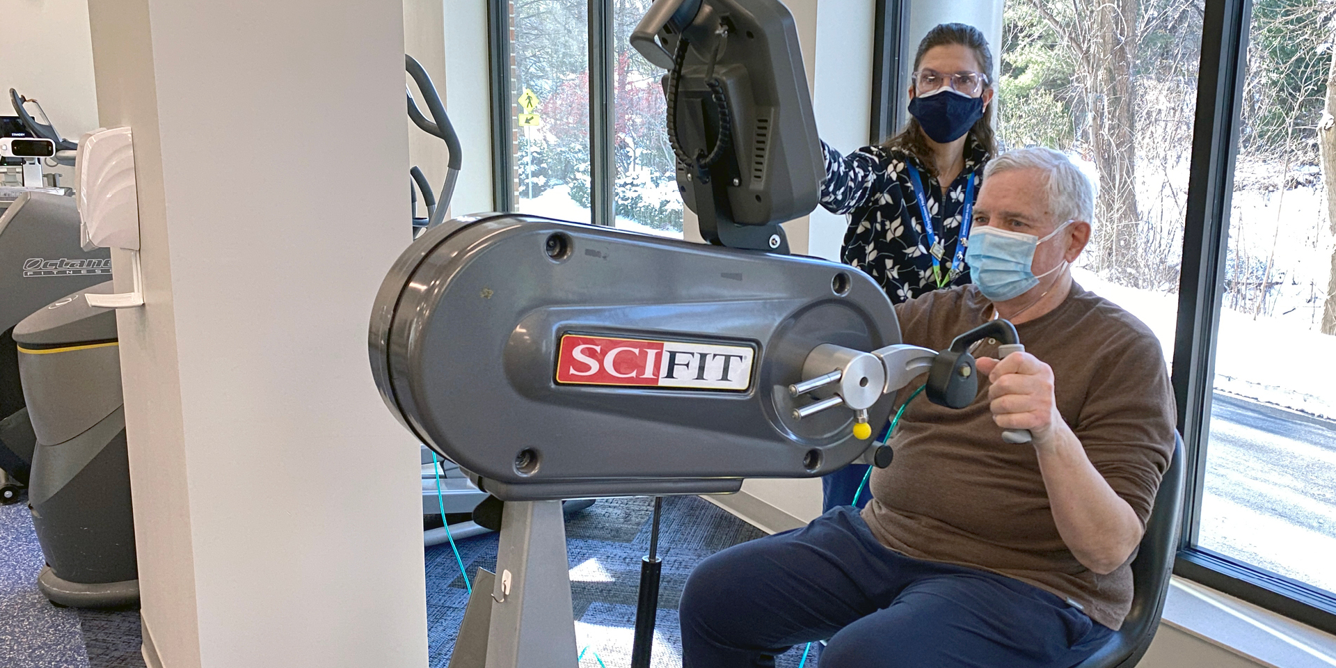 Man using arm bike at rehab | Doylestown Health